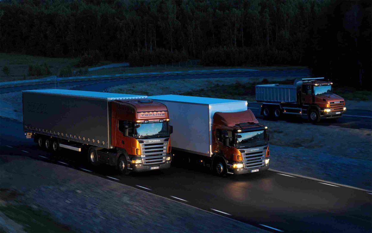 https://relyonshipping.com/wp-content/uploads/2015/09/Three-orange-Scania-trucks-1200x750.jpg